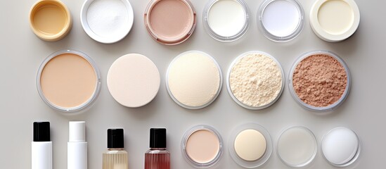 various samples of hygiene and beauty products like powder compact, spray, and moisturizer are displ