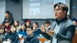 © pkproject - Instructor Giving Presentation to Attentive Students in Classroom Setting
