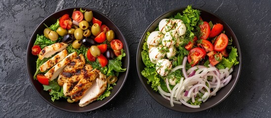 Leinwandbilder - Top view of two appetizing salads: one with mozzarella, olives, chicken, and veggies, the other a delightful mix of white onion, tomatoes, lettuce, and parsley. Image includes copy space.