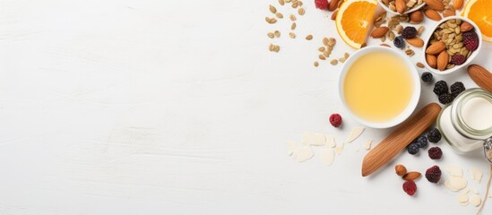 Poster - A homemade granola blend with dried fruit and nuts, accompanied by healthy breakfast staples like honey, milk, and fruit on a white backdrop with copy space image.