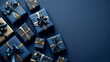 © Nicolai - A festive arrangement of variously sized blue gifts on a blue background