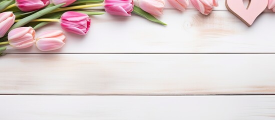 Poster - Valentine's Day-themed wooden white background adorned with pink tulips, hearts, and a copy space image for text.