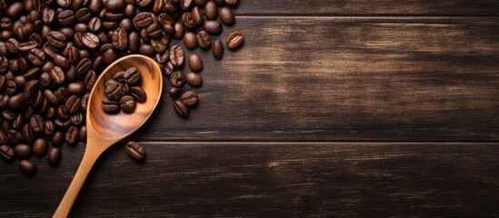 Aufkleber - Coffee bean on wooden background with a spoon holding a roasted coffee bean, creating a rustic setting with copy space image.