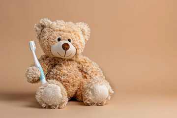 Teddy bear with a toothbrush on an empty meringue background with space for text or inscriptions. Children's tooth brushing theme
