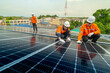 © ultramansk - engineer man inspects construction of solar cell panel or photovoltaic cell by electronic device. Industrial Renewable energy of green power. factory worker working on tower roof.