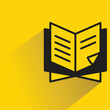 © bigpa - book icon with shadow on yellow background