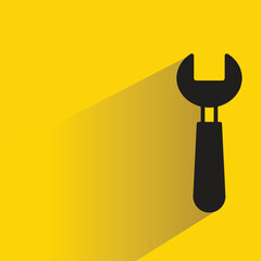 Wall Mural - wrench icon with shadow on yellow background