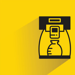 Sticker - coffee maker icon with shadow on yellow background