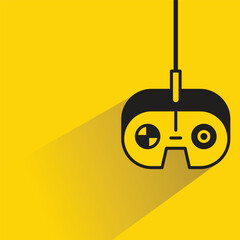 Wall Mural - game controller and joystick icon on yellow background