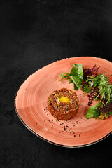 Sticker - Gourmet Beef Tartare with Quail Egg and Mixed Salad on Terra Cotta Plate