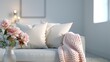© JP STUDIO LAB - Creamy tones fill this cozy living room, soft, warm lighting casts a gentle glow, inviting relaxation on the comfy couch with throw pillows and a soft rug underfoot