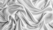 © Alexander Chaykin - A detailed view of folded white fabric, ideal for using as a background or texture in designs