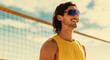 © Jacob Lund - Happy male athlete playing beach volleyball in a coastal championship game