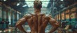 © weerayut - A muscular man showcases his well-defined back in a gym setting, highlighting strength and dedication to fitness and bodybuilding.