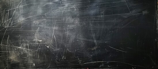 Poster - Blackboard with chalk traces on an empty surface for writing. Retro school board with a black texture, ideal for a copy space image.