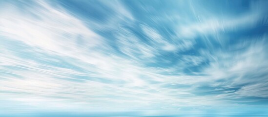 Wall Mural - abstract soft blurry blue and white sky background with white to blue color shades, ideal for templa