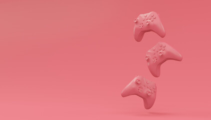 Wall Mural - Video game joysticks or gamepads in plain monochrome pink color background