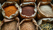 © Synaptic Studio - Assorted whole grains and seeds in paper bags. Whole Grains Month, health and nutrition concept.