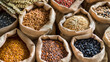 © Synaptic Studio - Assorted whole grains and seeds in paper bags. Whole Grains Month, health and nutrition concept.