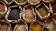 © Synaptic Studio - Assorted whole grains and seeds in paper bags. Whole Grains Month, health and nutrition concept.