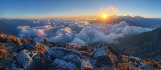 Wall Mural - Sunrise Over Mountainous Landscape with Sea of Clouds