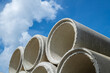 © yotrakbutda - Asbestos cement pipes stacked on a construction site
