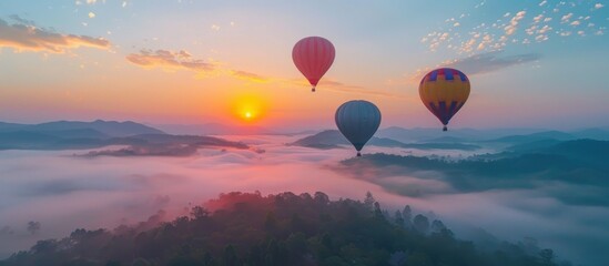 Wall Mural - Hot Air Balloons Soaring Over a Misty Sunrise