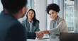 © peopleimages.com - Business people, meeting and shaking hands for job interview, recruitment and introduction in public relations. Woman, clients or candidate with handshake in welcome, onboarding or career opportunity
