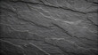 © Pixel Stock - Black stone background with copy space for header design. Texture of concrete wall surface