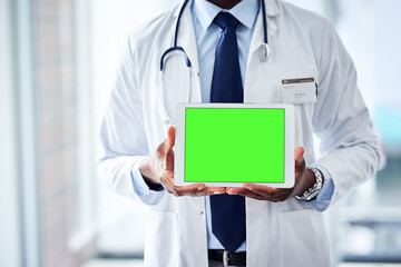 Canvas Print - Green screen, tablet and hands of doctor at hospital with mockup for healthcare, help or questions. Digital, space and man surgeon at clinic with how to, steps or Telehealth consulting app sign up