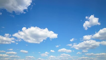 Wall Mural - beautiful blue sky with soft white clouds timelapse for abstract background