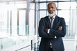 © peopleimages.com - CEO, portrait and mature black man with arms crossed for corporate career, business and leadership. Face, professional and confident entrepreneur, manager or investment advisor in office in Kenya