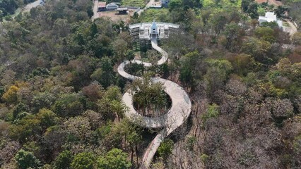 Wall Mural - Aerial view of the skywalk in Phayao province of Thailand. Located on Wat Phrathat Chom Thong temple for viewing Phayao lake the largest freshwater lake in the northern Thailand.