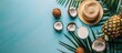 © HN Works - Top view of a tropical setup featuring a ripe pineapple, cracked coconut with milk and a hat on a flat surface with a copy space image, evoking a summer vibe.