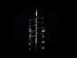 © AmazingAerialAgency - Aerial view of synchronized rowing team on dark water, Boston, Massachusetts, United States.