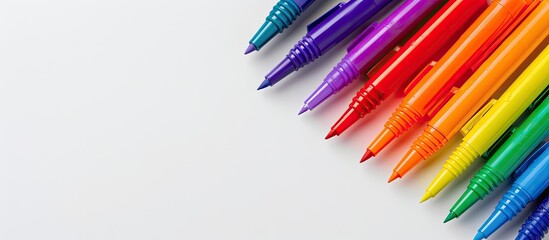 Aufkleber - Rainbow-colored markers on a white backdrop resembling the LGBTQ pride flag with copy space image.