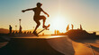 © XaMaps - Energetic teen skateboarder performing a trick at a skatepark during sunset hours.