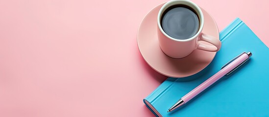 Aufkleber - Blue notebook and pen on a pink background with a theme of business, recreation, and planning, perfect for a copy space image.
