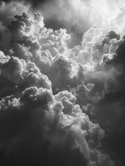 Wall Mural - The sky is filled with clouds, creating a moody and dramatic atmosphere. The clouds are dark and heavy, giving the impression of an impending storm. Concept of foreboding and unease