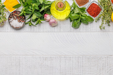 Wall Mural - Various herbs and spices on the table