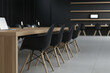 © jazzi - Interior of a modern office meeting room in black and white, featuring wooden furniture including a conference table with black chairs