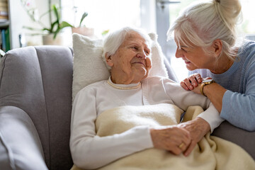 Sticker - Elderly woman with her caregiver at nursing home
