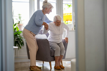 Poster - Elderly woman with her caregiver at nursing home
