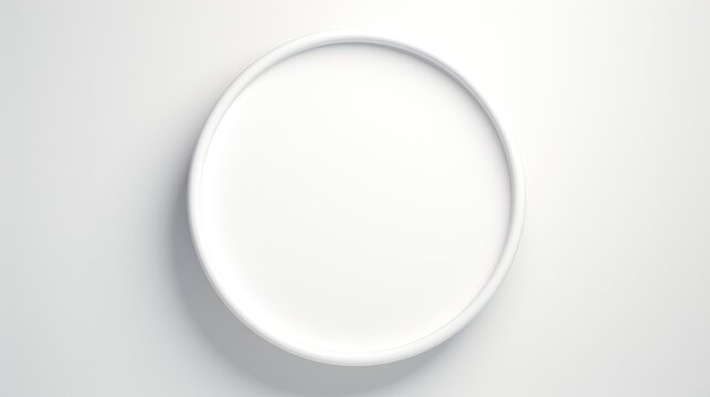 A classic, circular frame with a polished finish, its simplicity highlighting the beauty of the pure white background.