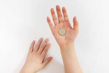 Hand of a child receiving allowance 2