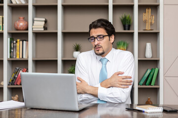 Wall Mural - Tired frustrated and overworked business man sitting in the office and thinking about problems in business	