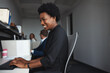 © Reese Coop/peopleimages.com - Office, working and business woman in cubicle with computer, typing email or daily operations. Professional, career or female clerk in workspace with keyboard, data entry or record info for coworking