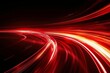 © Irina - Abstract red lines depict the speed of the road in red. Red light trails on a dark background, with a high speed and fast motion blur effect.