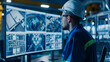 © Papisut - Smart Manufacturing Engineer Standing confident and computer screen document background.