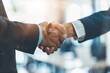 © Kava - Professional people in suits shaking hands after a successful interview in a well-lit modern office. Business partnership, job interview, and professional agreement concepts on a modern background.